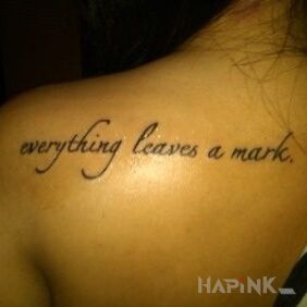 Tattoo Trace on the shoulder blades motif: lettering style: calligraphy