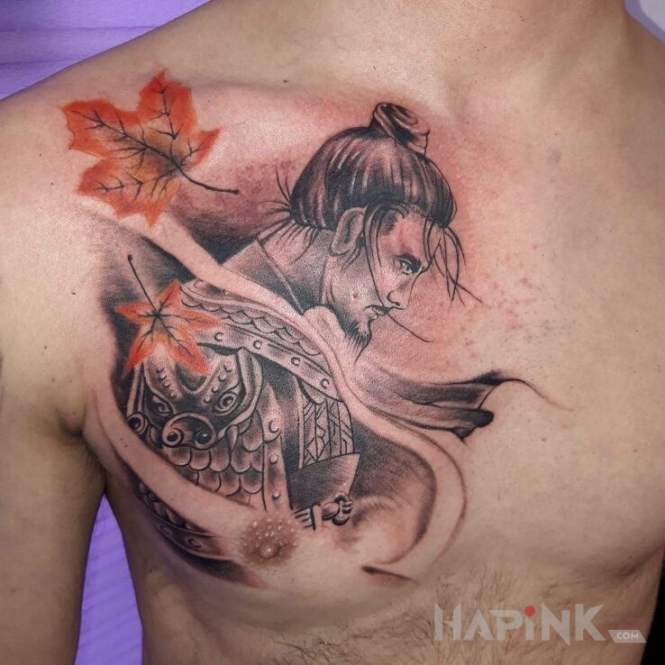Tattoo Wojownik in black and gray motif and realistic style on the chest
