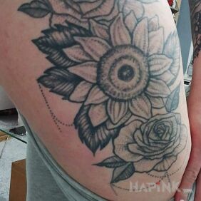 Tattoo Women's tattoo on the leg motif: black and gray style: graphic / illustrative