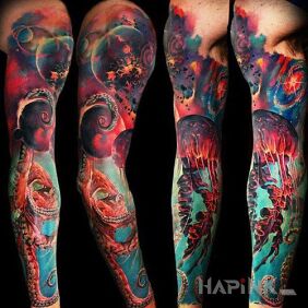 Tattoo Water and space on the upper arm motif: colorful style: realistic