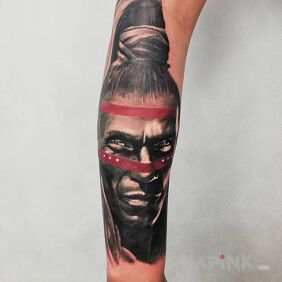 Tattoo Warrior,leader on the forearm motif: black and gray style: realistic