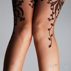 Tattoo Twigs on the leg motif: other style: graphic / illustrative