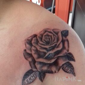 Tattoo Date rose on the collarbone motif: flowers style: realistic