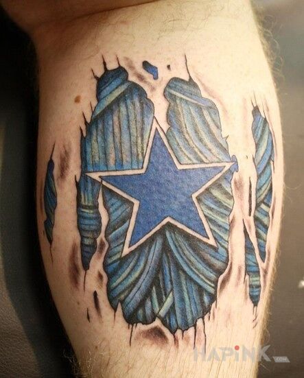 Tattoo Dallas Cowboys in other motif on the calf