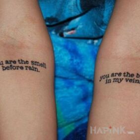 Tattoo Rhyme on the forearm motif: lettering style: calligraphy