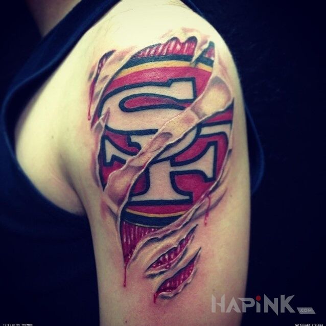 Tattoo San Francisco 49ers in other motif on the upper arm