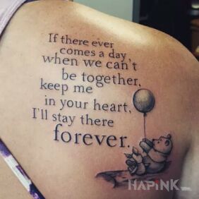 Tattoo From Winnie the Pooh on the shoulder blades motif: lettering style: calligraphy
