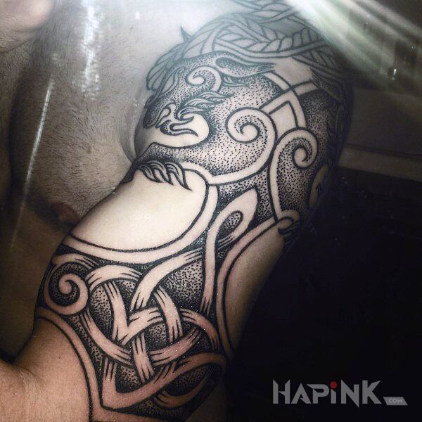 Tattoo Celtycko in zodiac signs motif and Celtic / Nordic style on the upper arm