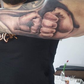Tattoo Transferred from photo to hand on the forearm motif: black and gray style: graphic / illustrative