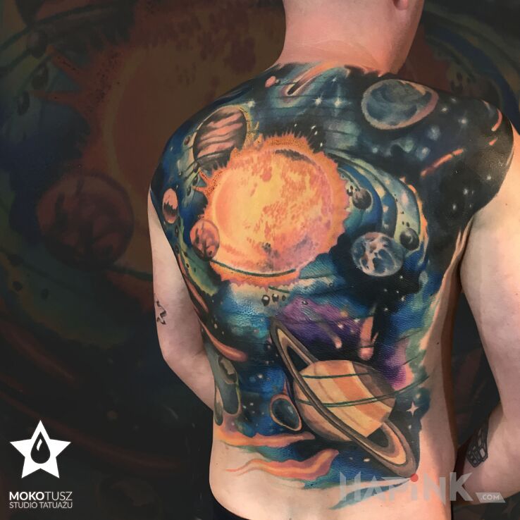 Tattoo Kosmos in colorful motif and realistic style on the back