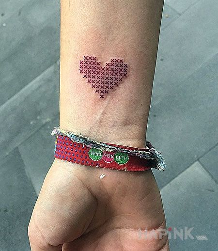 Tattoo Serce <3 in other motif and embroidered style on the wrist