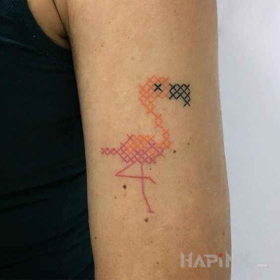 Tattoo Flaming in animals motif and embroidered style on the upper arm