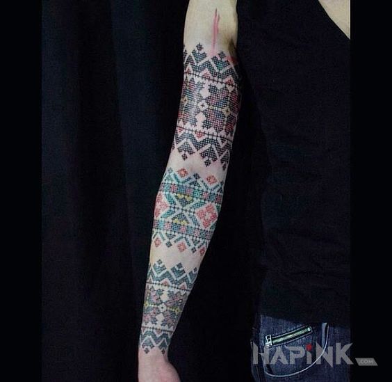 Tattoo Haftowany rękaw in colorful motif and embroidered style on the forearm