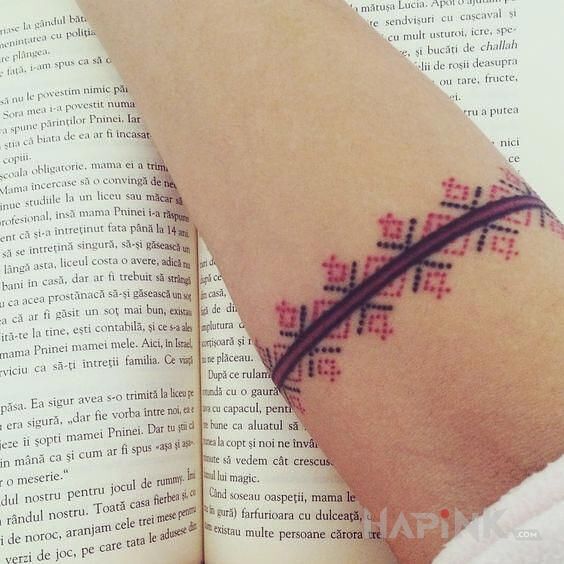 Tattoo Opaska in other motif and embroidered style on the forearm