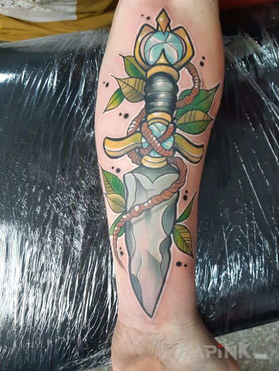Tattoo Sztylet in objects motif and neo-traditional style on the forearm