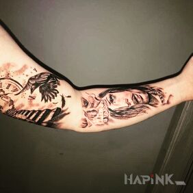 Tattoo Another ? on the upper arm motif: black and gray style: realistic
