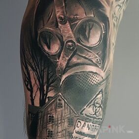 Tattoo Gas mask on the upper arm motif: black and gray style: realistic