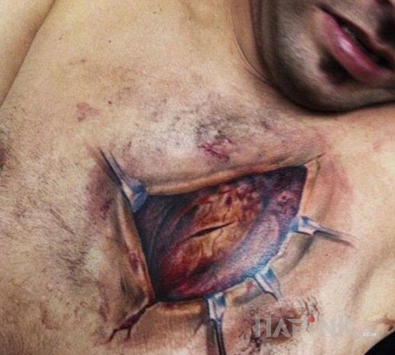 Tattoo Operacja na otwartym sercu in 3D motif and realistic style on the chest