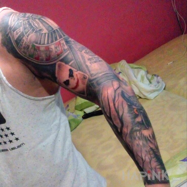 Tattoo Sowa i spółka in black and gray motif and realistic style on the forearm