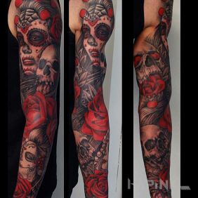 Tattoo Santa Muerte red on the forearm motif: colorful style: realistic