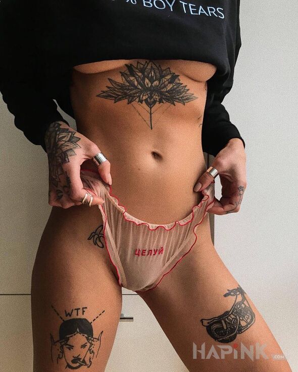 Tattoo Kwiat lotosu in black and gray motif and graphic / illustrative style underboob
