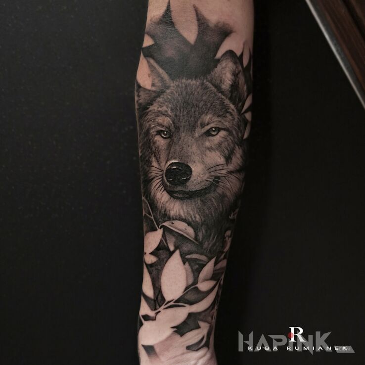 Tattoo Wilk in black and gray motif and realistic style on the forearm