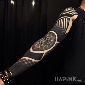 Tattoo Black and mandala on the forearm motif: black and gray style: dotwork