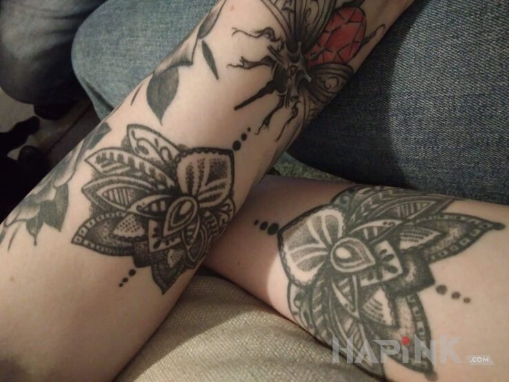 Tattoo LOTOSY in flowers motif and graphic / illustrative style on the forearm