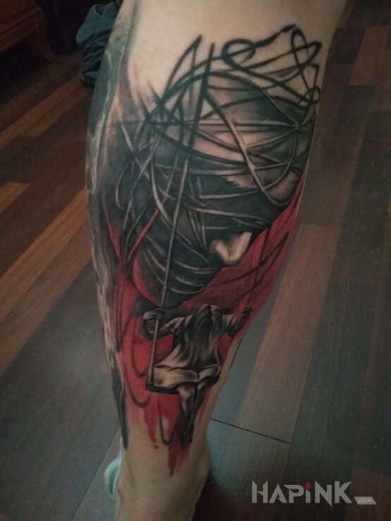 Tattoo Strach in dark motif and graphic / illustrative style on the calf