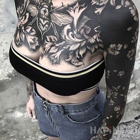 Tattoo Czaaaarno on the breast motif: black and gray style: blackwork / blackout