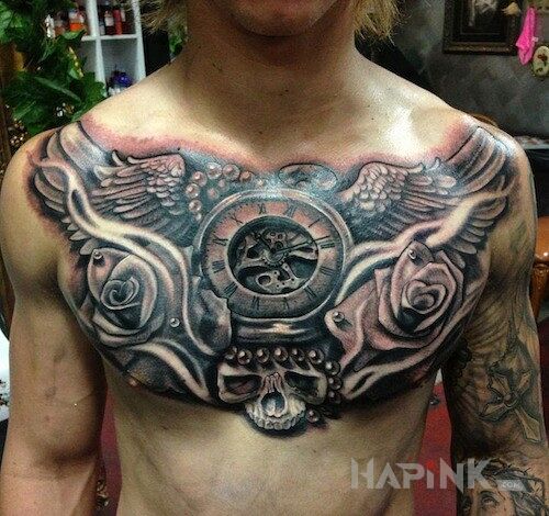 Tattoo Zegar i skrzydła in 3D motif on the chest