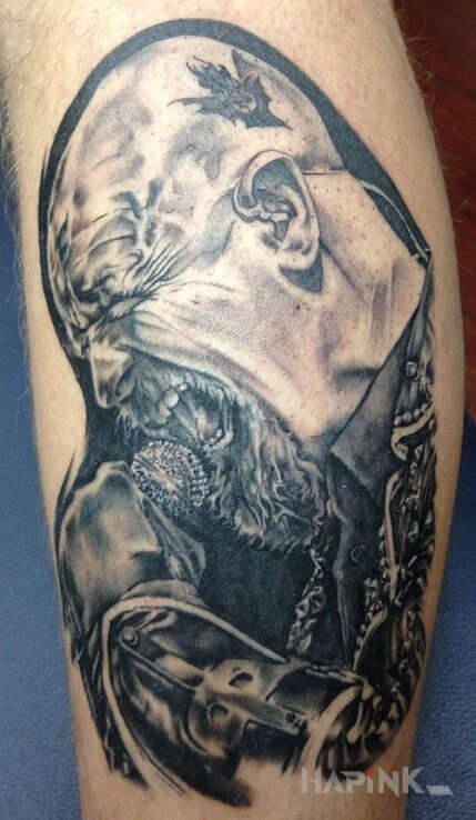 Tattoo Portret in faces motif on the forearm