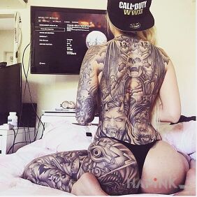 Tattoo I play the game on the leg motif: black and gray style: realistic