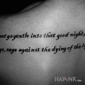 Tattoo Caption on the shoulder blades motif: lettering