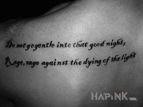 Tattoo Napis in lettering motif on the shoulder blades