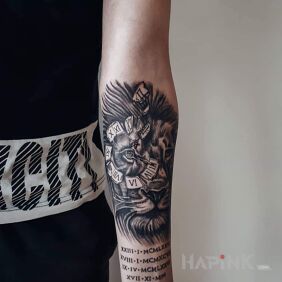 Tattoo Lion with a clock on the forearm motif: animals style: realistic