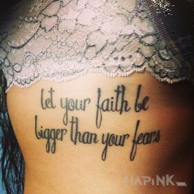 Tattoo Motto on the ribs motif: lettering