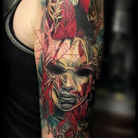 Tattoo Mask on the upper arm motif: colorful style: realistic