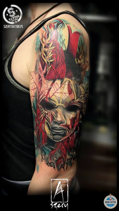 Tatuaż maska w motywie kolorowe i stylu realistyczne na ramieniu