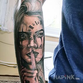 Tattoo A woman with time on the forearm motif: objects style: realistic