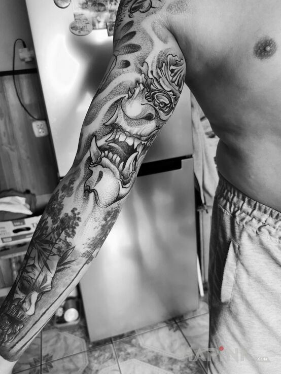 Tattoo Diabeł ? in black and gray motif and graphic / illustrative style on the forearm