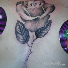 Tattoo Rose on the breast motif: flowers style: realistic