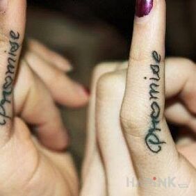 Tattoo Tattoo for a couple on the fingers motif: Love
