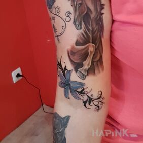 Tattoo A gorgeous horse ? on the upper arm motif: animals style: realistic