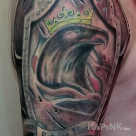 Tattoo Shield on the upper arm motif: patriotic style: graphic / illustrative