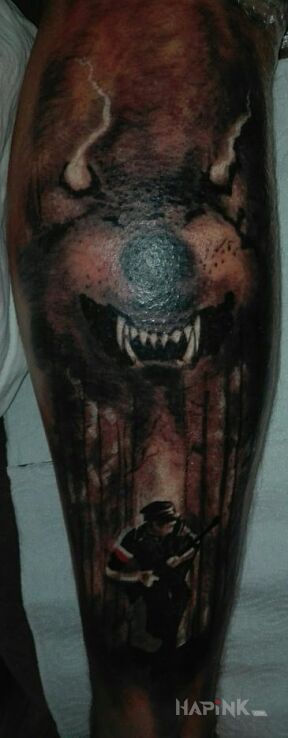 Tattoo Żołnierz Wyklęty in patriotic motif and graphic / illustrative style on the calf