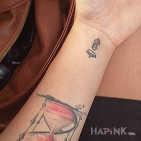Tattoo Hourglass,lady on the wrist motif: objects style: graphic / illustrative
