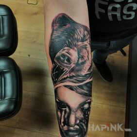 Tattoo Woman with a bear on the forearm motif: dark style: realistic