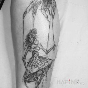Tattoo Doll on the calf motif: black and gray style: sketch