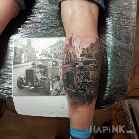 Tattoo Classic on the calf motif: black and gray style: realistic